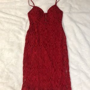 Bright red lace dress from Bebe. Only worn once!